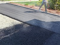 JS柏油專業機械進行線西柏油路面壓實