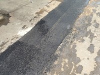 JS柏油施工現場，專業人員操作柏油機具